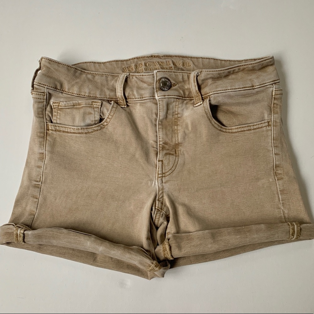 Tan AEO super stretch mid rise shorts